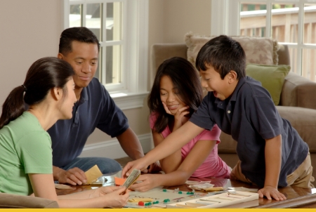 A family enjoying a game night together