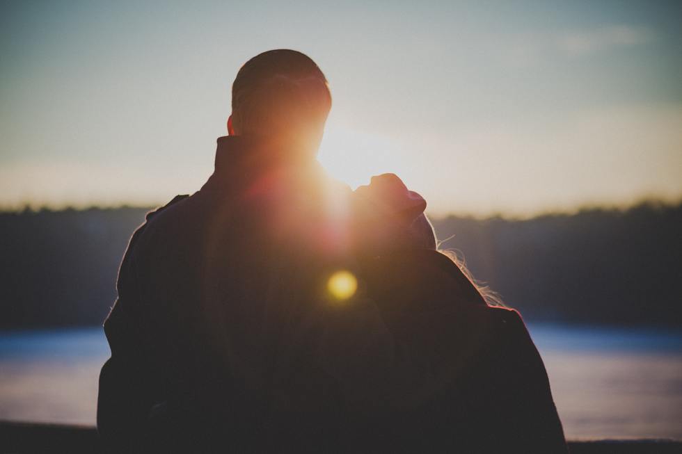 A couple enjoying a nice sunset